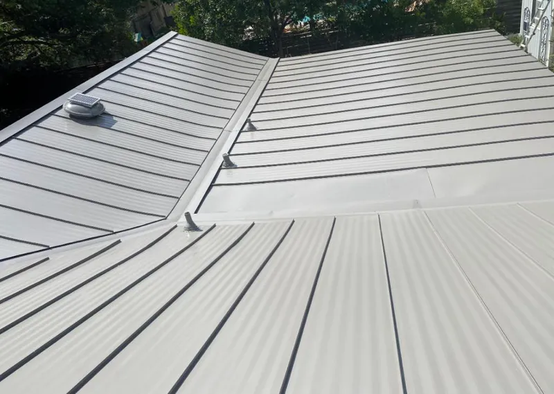 Solar attic fan installed on a metal roof for Roof Ventilation in San Francisco